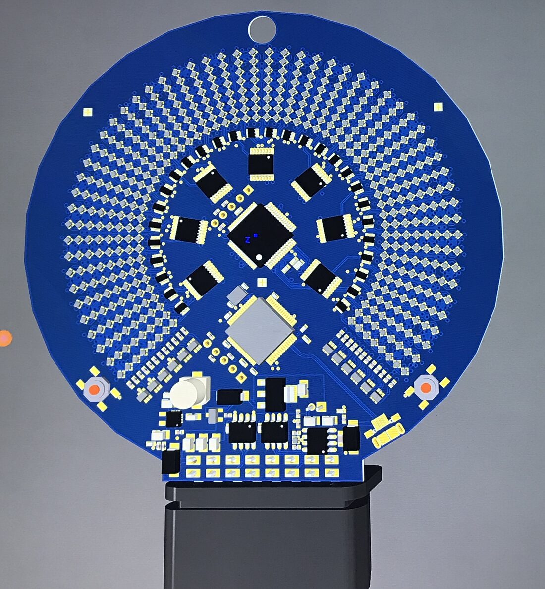 3D render of the speedometer board in blue with components and a connector below