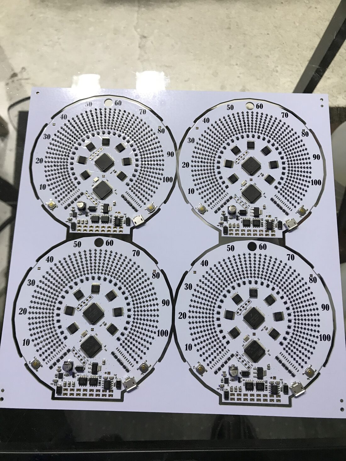 Panel of four assembled speedometer boards